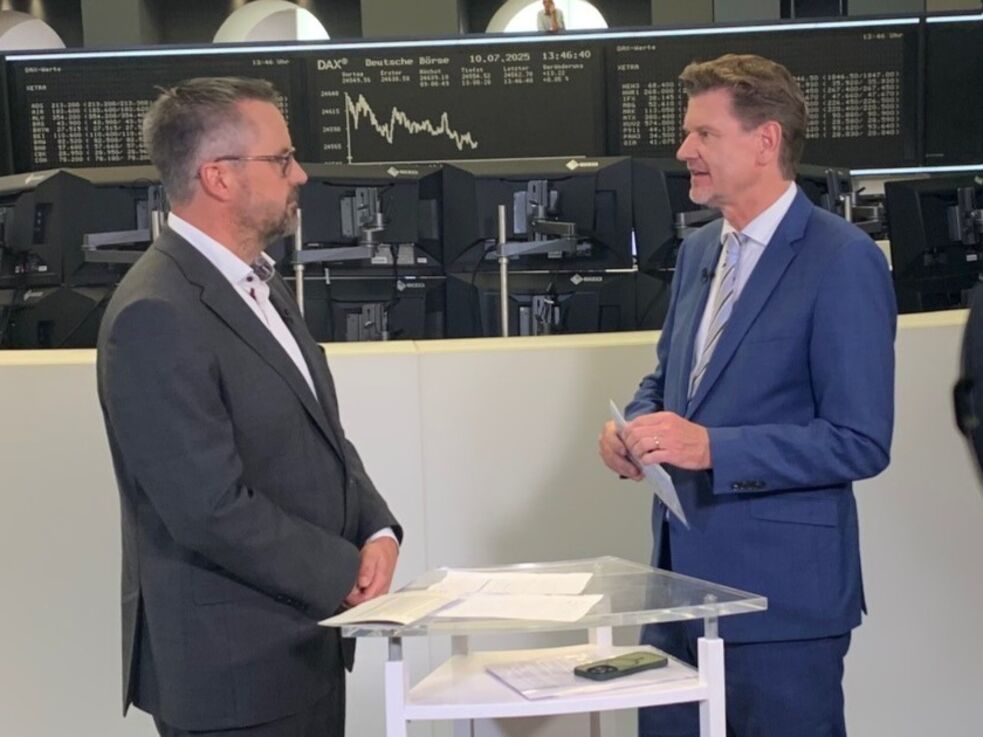 Karsten Kührlings spricht mit Andreas Franik an der Frankfurter Börse